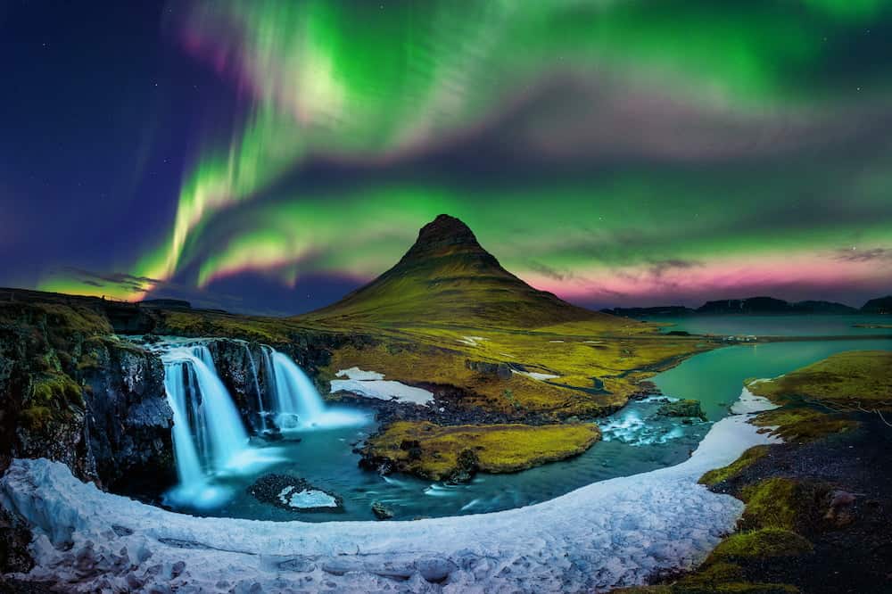 Northern Lights Aurora borealis above Kirkjufell Mountain on Snaefellsnes Peninsula in Iceland