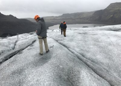 Tourists enjoying glacier walk adventure on Solheimajokull Glacier on the South Coast of Iceland
